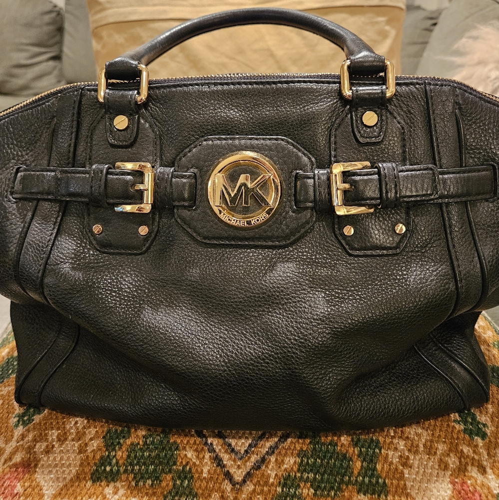 Gorgeous pebbled black leather purse.